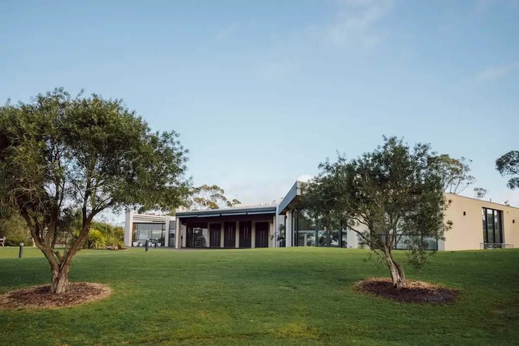 Landscaped green lawns and modern building exterior at Geelong Memorial Park Chapel, located at 42/110 Burvilles Rd, Mount Duneed.